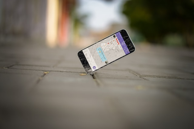 iPhone shattering on street