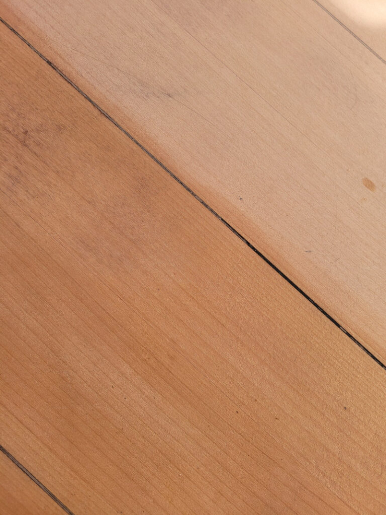 Table top showing close up of wood grain.