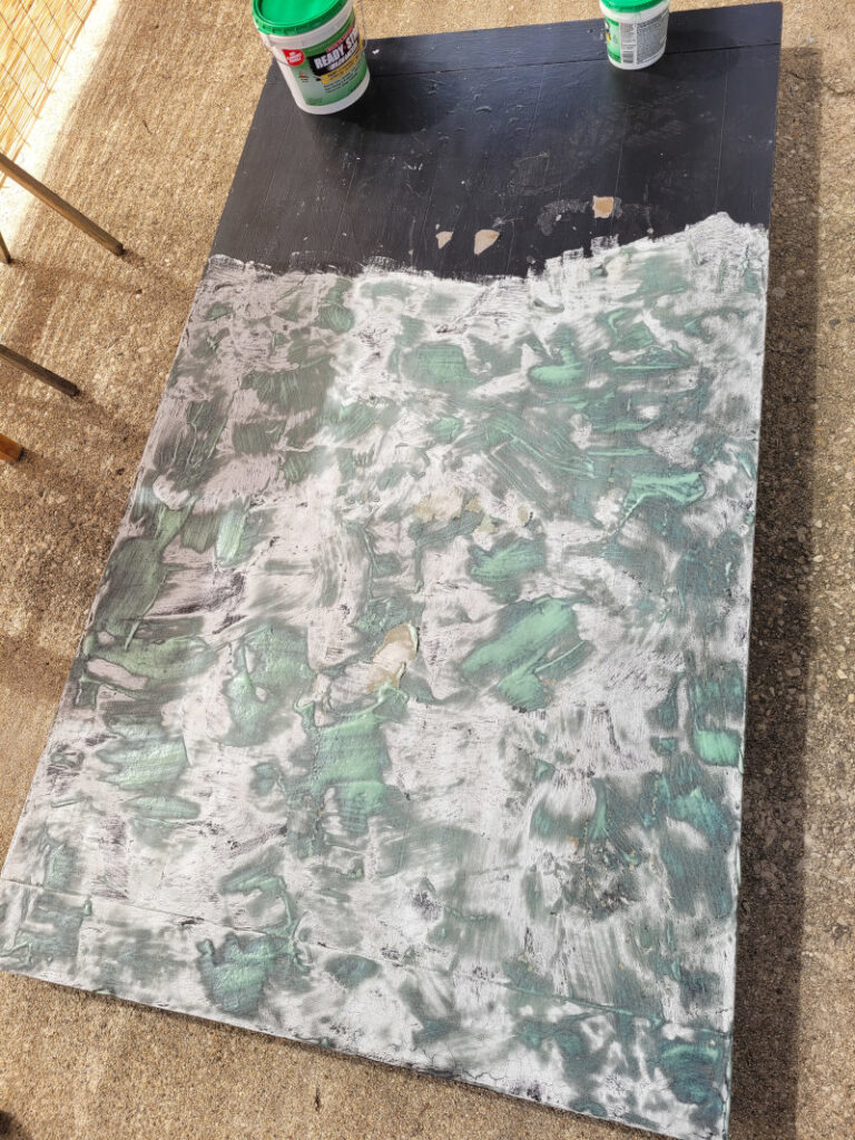 Table top with stripping chemical applied.